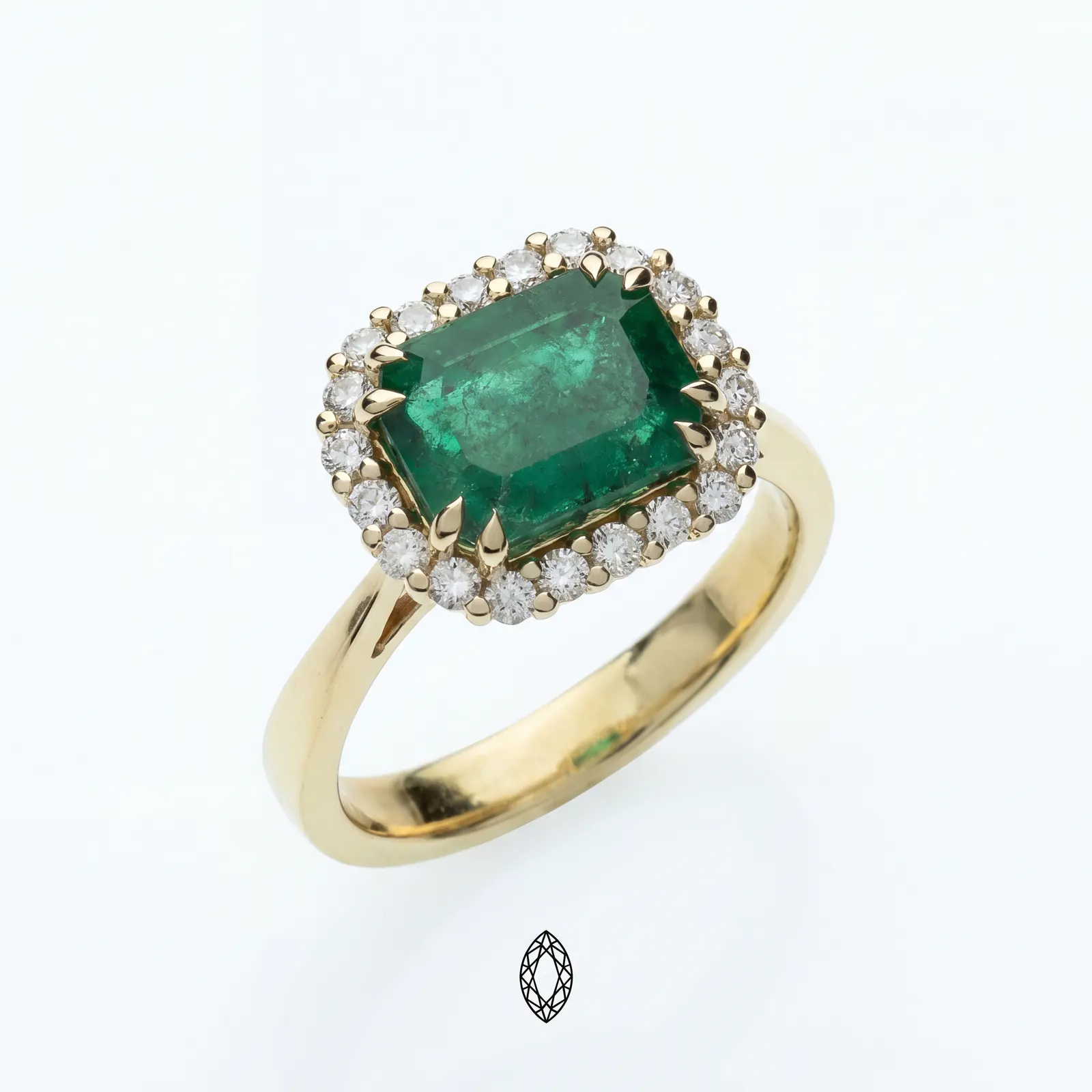 Emerald and diamond halo ring — studio jewelry photography, Lebanon